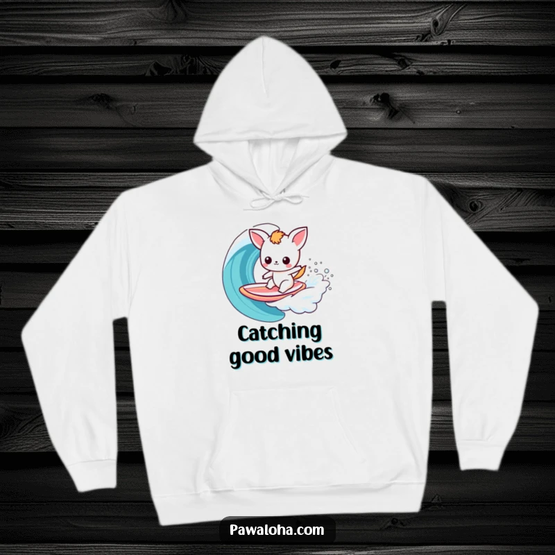 Funny Kawaii Surfer Animal Hoodie: Cute cartoon character on a surfboard, riding a vibrant rainbow wave, perfect for staying warm and stylish.