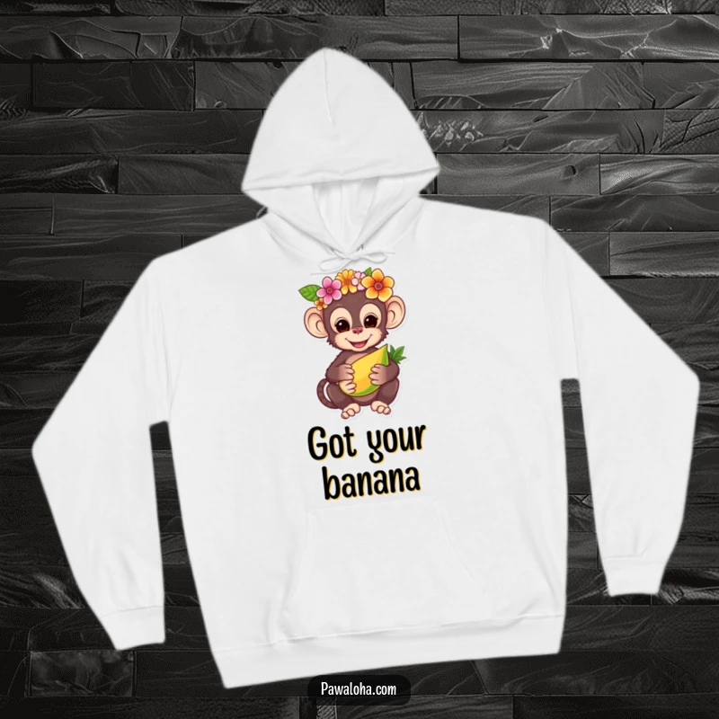 Funny hoodie featuring a charming monkey adorned with a flower crown, offering a tropical fruit, providing cozy comfort and delightful jungle vibes.